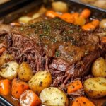 Italian pot roast cooked in a slow cooker with tender beef, vegetables, and rich gravy