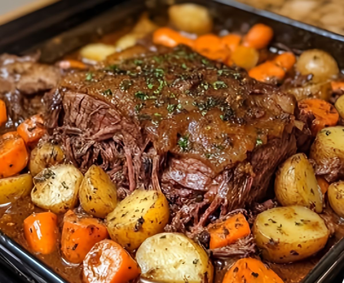 Italian pot roast cooked in a slow cooker with tender beef, vegetables, and rich gravy